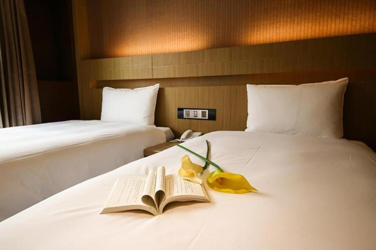 Talmud Hotel Тайнань Экстерьер фото